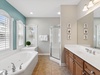 Primary King En-Suite - Soaking Tub + Walk-In Shower