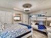 Guest Suite - Furnished with a Queen Size Bed and Twin over Twin Bunk Bed