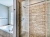 Enjoy the Walk-In Shower & Soaking Tub in the King Guest En-Suite