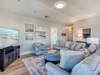 Cozy Up for a Movie Night in the Beachy Living Space