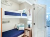 Bunk Area - A Twin over Twin Bunk Bed Located in the Hallway