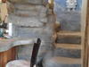 hand carved stone steps leading up to the bed loft