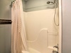 with shower and tub.