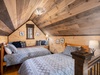 The upstairs loft features two twin beds
