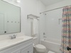 the hall bathroom is shared by the second and third bedrooms.