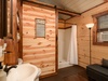 With a shower and large barn door that slides