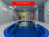 New Cabin with indoor pool Glass Garage door
