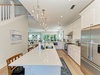 Sea Glass on Park Kitchen Bar Island with Dining Area View (1)