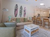 Unwind in your coastal-inspired living space, where beachy decor and a fully equipped kitchen invite you to relax and feel at home. Perfect for lazy mornings and casual gatherings.