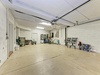 The property features a spacious basement garage with ample room for vehicle parking, bicycles, and storage of guest belongings.