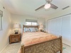 Drift off in this serene bedroom with a cozy bed, coastal decor, and plenty of closet space for your belongings. The ceiling fan keeps you comfortable year-round.