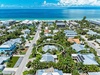 Rest Assured Aerial View with Beach (1)