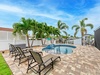 Salty Sea Life Outdoor Lounge Chairs and Pool