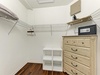 Your spacious walk-in closet features extensive shelving, secure safe storage, and a dresser—plenty of room to unpack and settle in for your entire stay.
