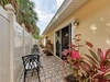 Your private patio offers peaceful outdoor dining surrounded by tropical gardens and complete privacy.