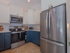 Your fully equipped kitchen features sleek stainless appliances and two-tone cabinetry—plenty of space to prepare favorite meals or brew morning coffee before exploring.
