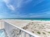 Pristine white sand beach with crystal-clear turquoise waters stretches endlessly before this beachfront balcony.