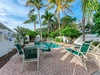 Relax poolside under swaying palms where tropical breezes and turquoise waters create your perfect Florida getaway.