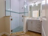 Refresh in your private bathroom with elegant subway tile shower, mosaic accents, and granite countertops. Modern fixtures and soft lighting create a spa-like retreat.