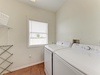 A dedicated laundry room with full-size washer and dryer keeps your vacation wardrobe fresh, plus a convenient drying rack for delicates.