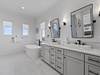 Master bathroom has dual vanities