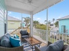 Relax on the screened-in porch