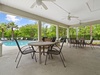 Covered seating area at the community pool