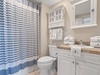 Full guest bathroom with shower/tub combo