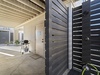 Outdoor shower and charcoal grill