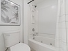 There is a shower/tub combo in the primary bathroom