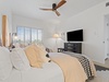 There is a flat-screen TV in the 2nd guest bedroom