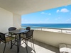 Dine al fresco on the beachfront balcony