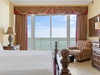 Master bedroom with private balcony access