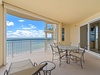 Dine al fresco on the beachfront balcony