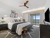 The primary bedroom has balcony access