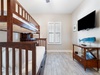 Guest Bedroom 2 features a twin over full bunk with a twin trundle