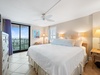 Primary bedroom with street view balcony