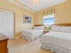 Guest bedroom with two full beds
