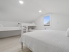 Third floor bunk room with queen bed