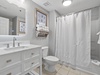 The guest bathroom is shared between guest bedroom 1 and guest bedroom 2