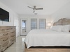 Main floor king guest bedroom 2 with deck access