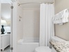 Full bathroom with a shower/tub combo