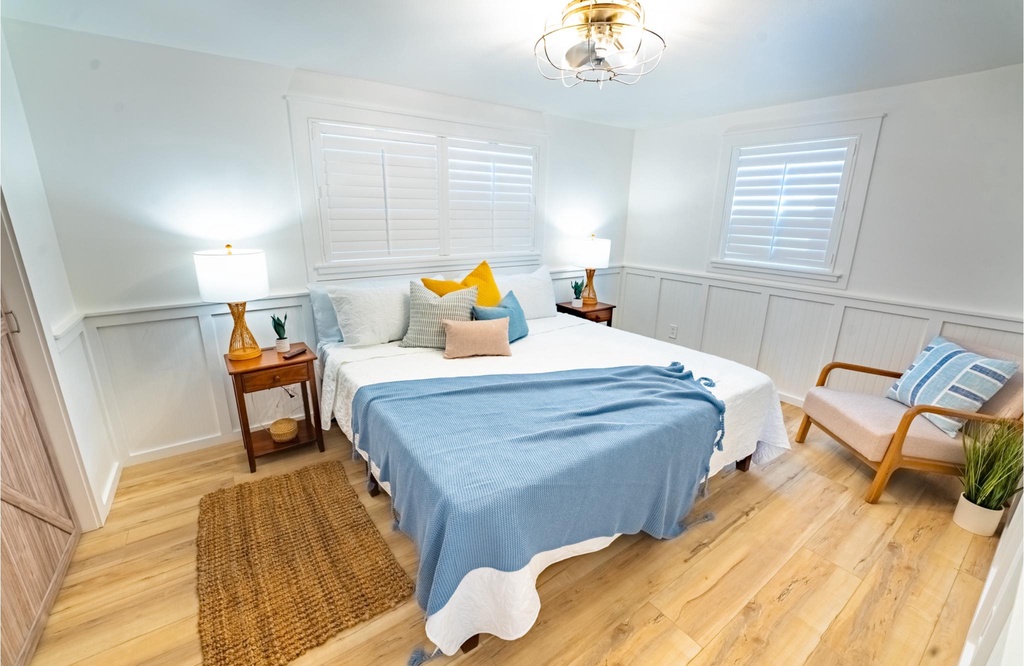 bright and cozy bedroom with natural light and modern decor