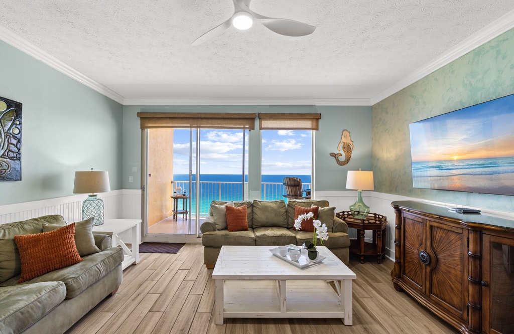 Relax in this coastal living room with ocean views and comfortable seating.