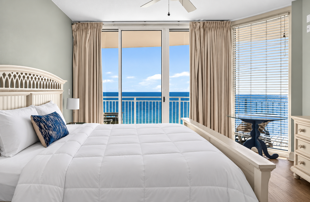 Wake up to breathtaking ocean views from your private balcony. This serene bedroom features a plush king bed, gentle coastal breezes, and direct access to stunning blue waters that greet you each morning.