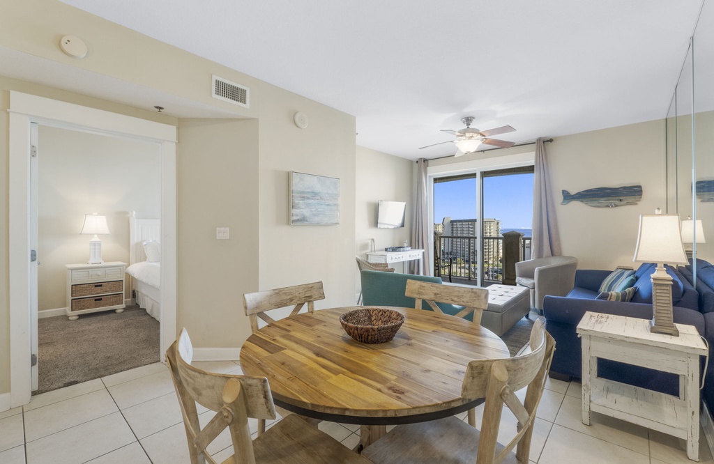 open living and dining area with coastal views and natural light