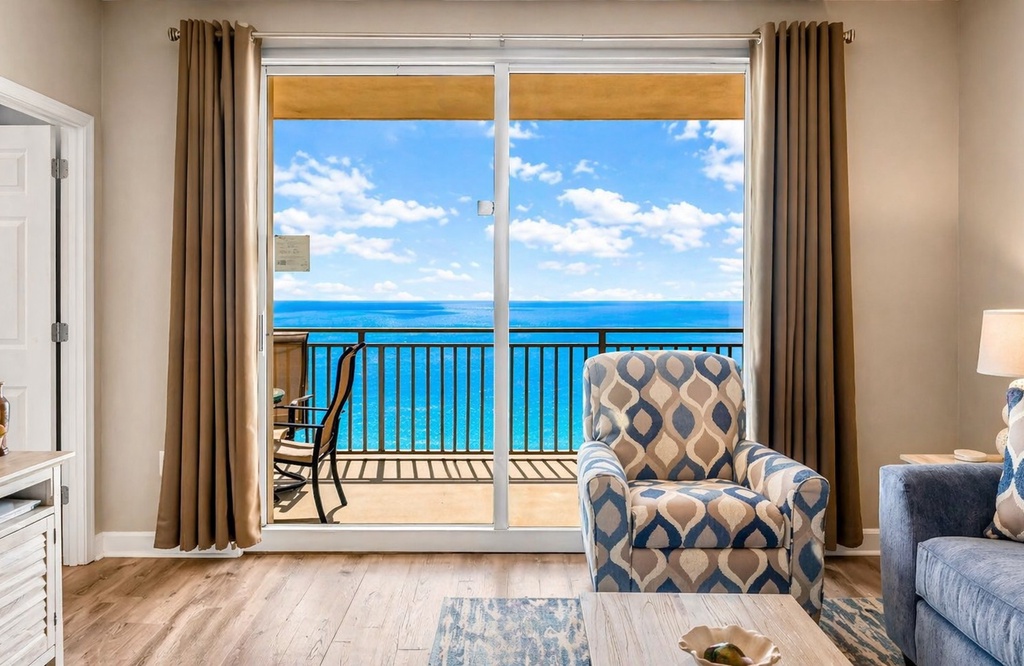 Step into your coastal retreat where stunning ocean views greet you through expansive balcony doors. Relax in the bright, airy living space designed for your comfort and unforgettable seaside moments.