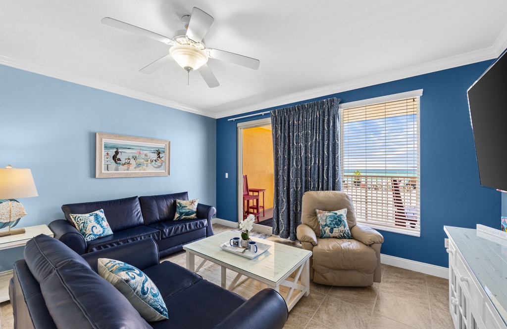 Relax in this coastal-inspired living room with ocean views and comfortable seating.