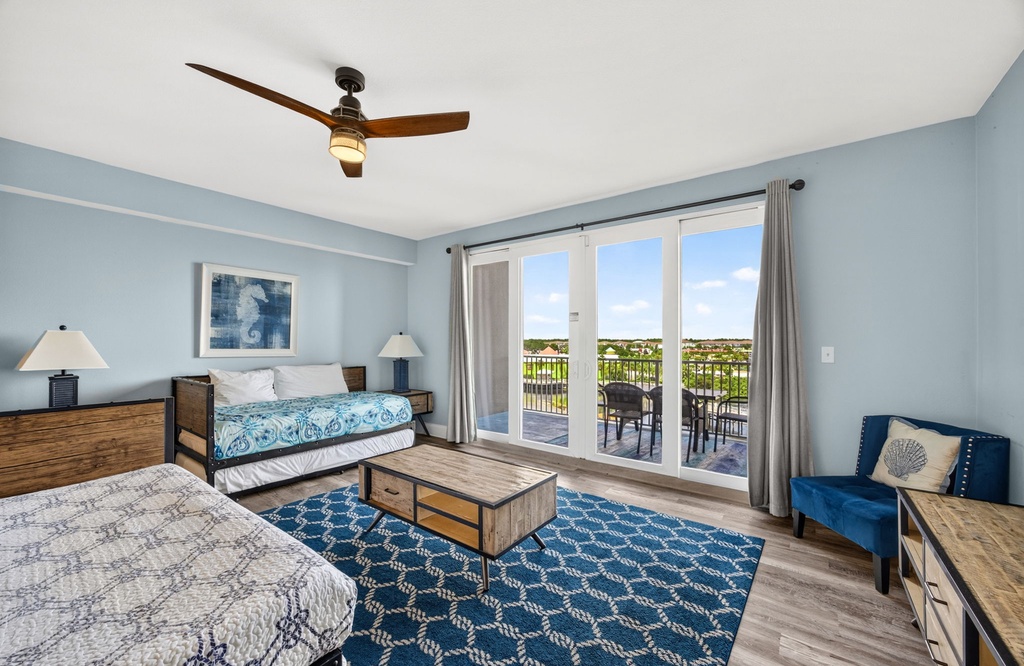 Step into your breezy retreat, where calming blue tones meet warm wood finishes and plenty of natural light. Your private balcony overlooks scenic views, perfect for morning coffee or sunset relaxation.