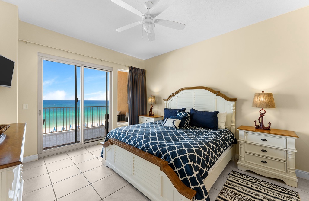 Relax in this coastal bedroom with ocean views and natural light.